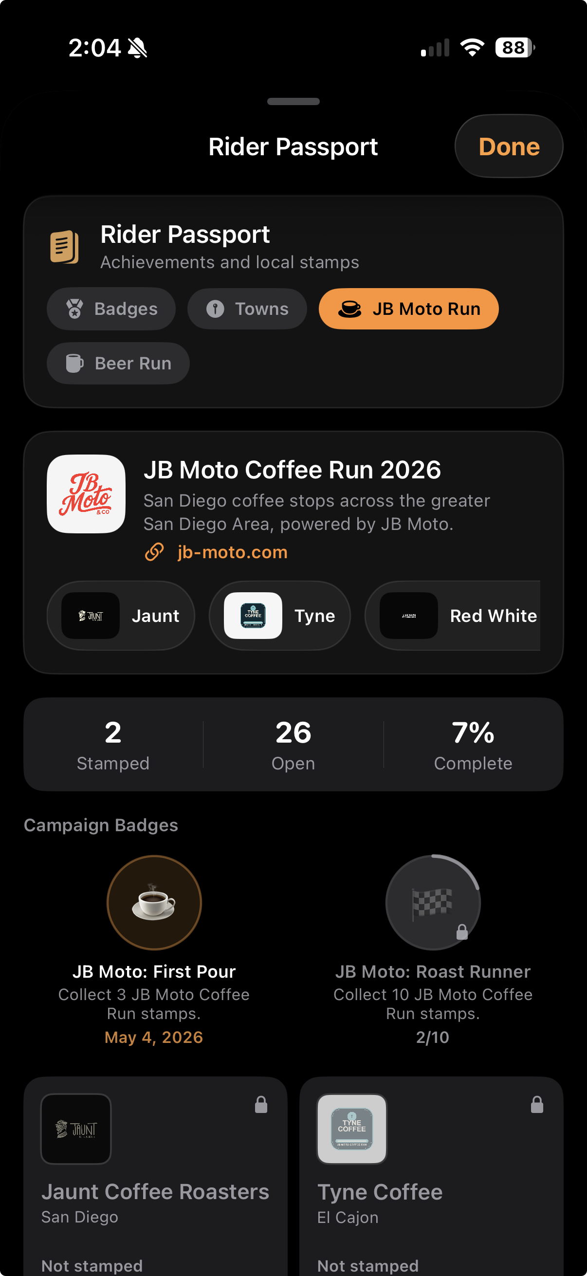 Rippin' Rider Passport screen showing the JB Moto Coffee Run passport, coffee stops, stamps, and local campaign badges.